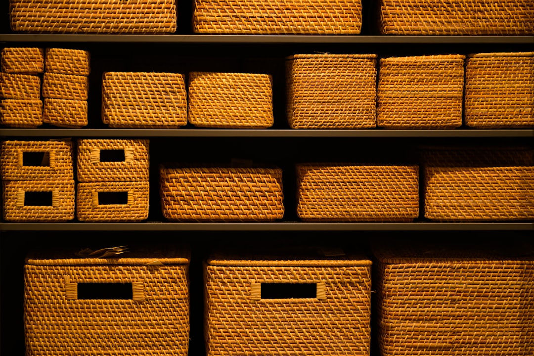 a-shelf-filled-with-lots-of-wicker-baskets-8h-kf4d97i4